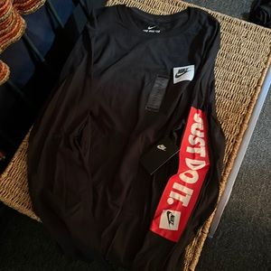 Black long sleve t with just do it in a red banner on the sleve